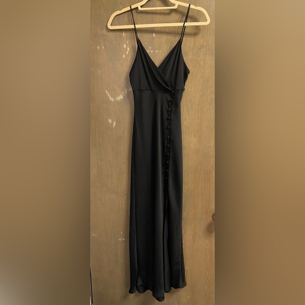 Long black dress with button and high slit detail!